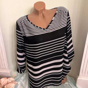 Cato. Size Medium. Black & white stripe pullover. V-neck. 3/4 sleeve. B100